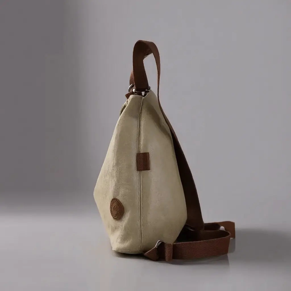 Sac à dos bandoulière femme voyage Beige vue de côté