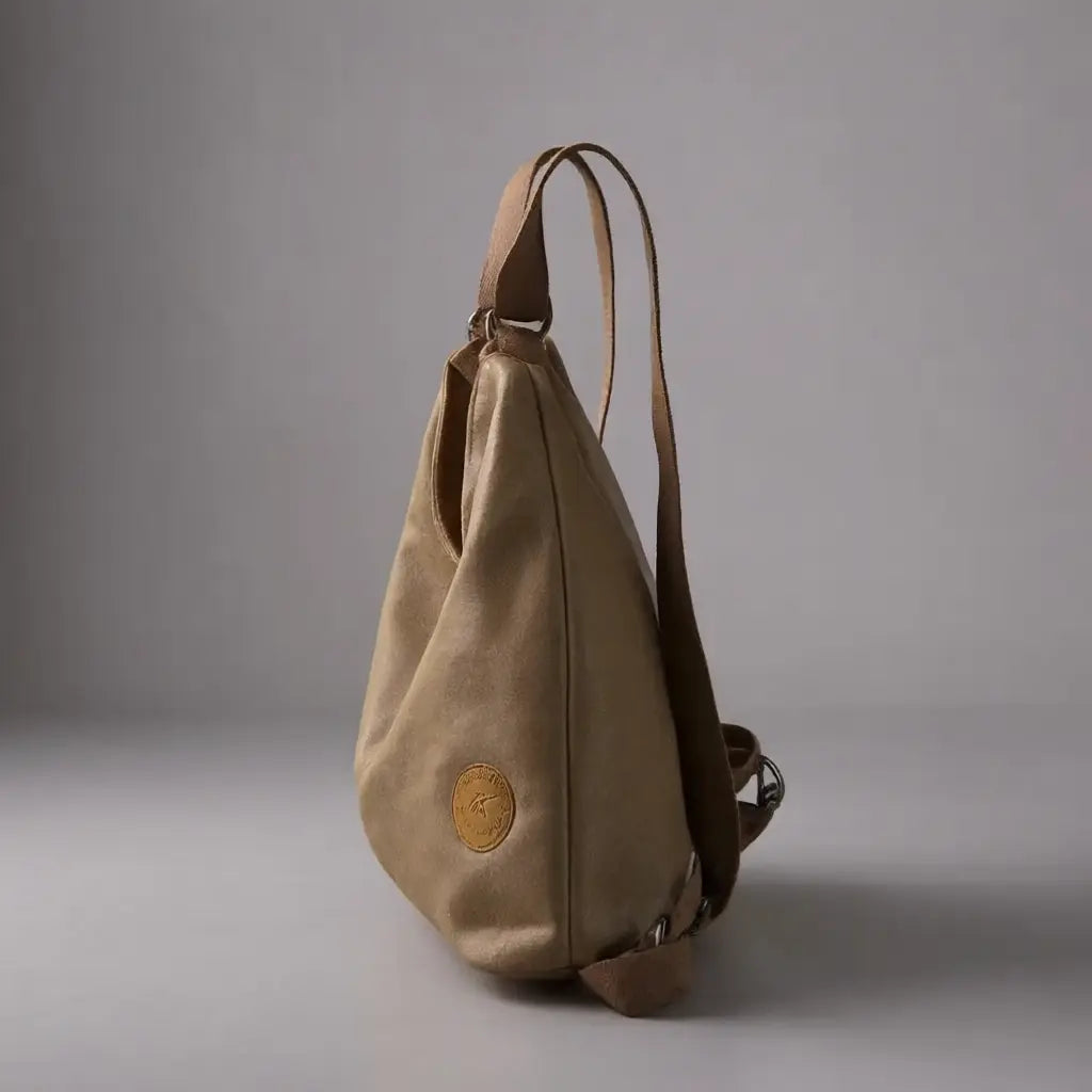 Sac à dos bandoulière femme voyage Marron vue de côté