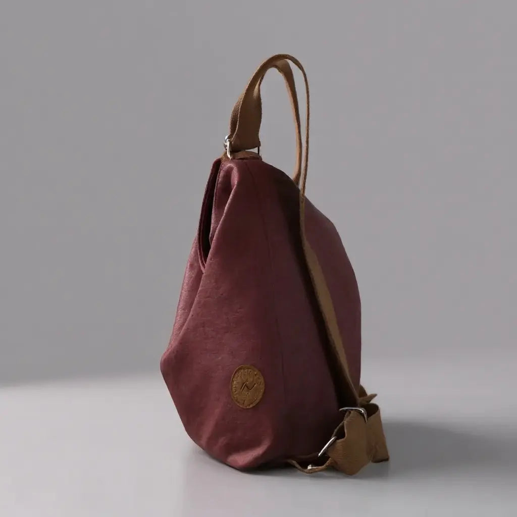 Sac à dos bandoulière femme voyage Violet vue de côté