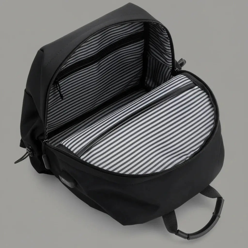 Intérieur du sac à dos cours minimaliste Noir avec compartiments et doublure rayée