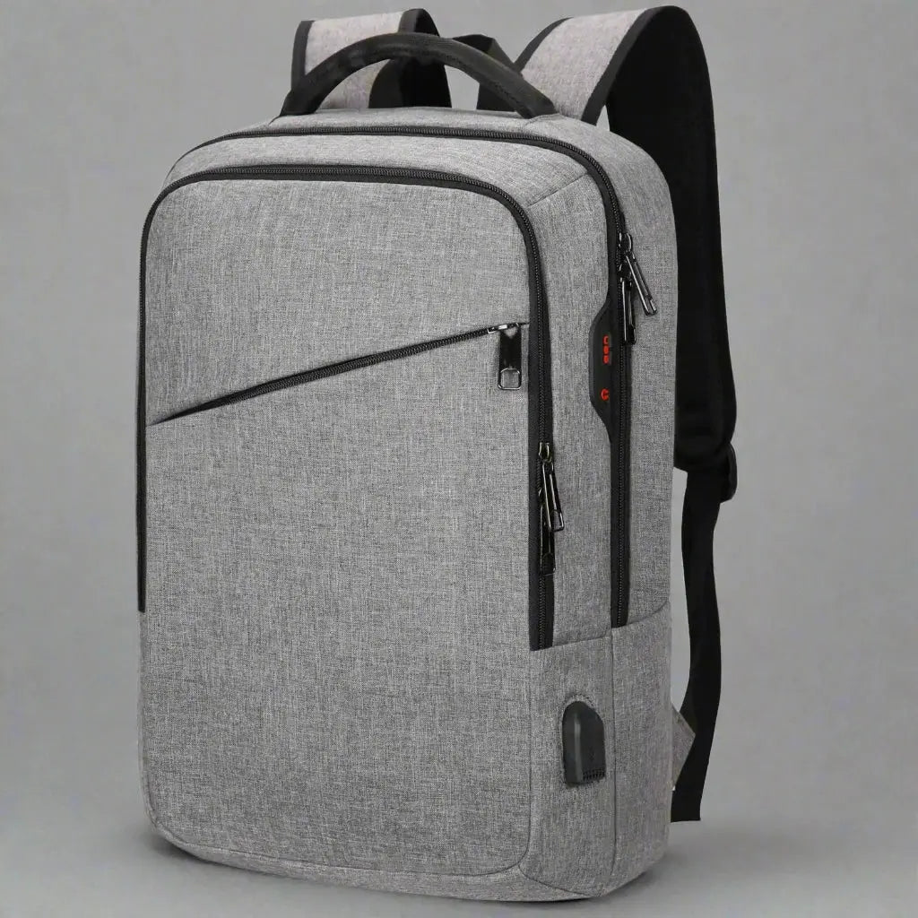 Sac à dos ordinateur imperméable homme Gris, vue de profil avec port USB