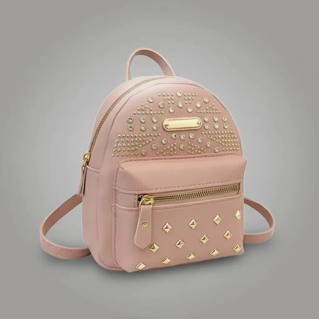 Sac a dos style punk Rose, vue de profil avec les sangles