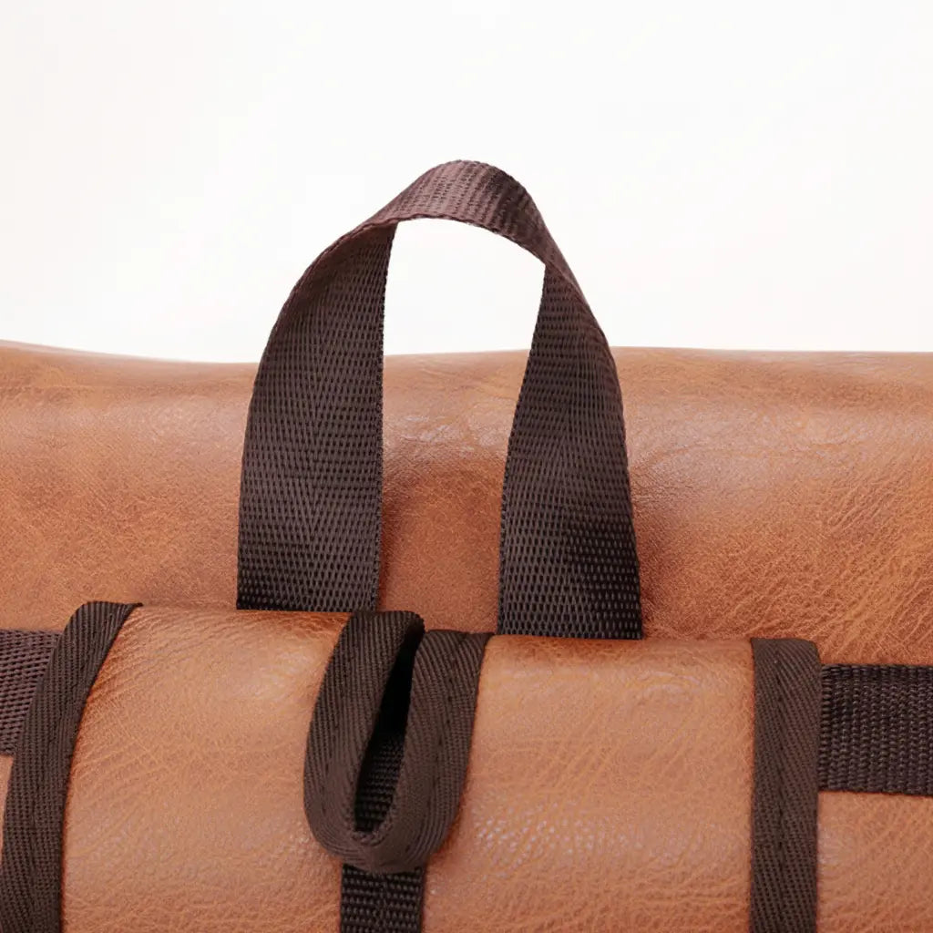 Sac à dos vintage homme Khaki, détail de la poignée supérieure et du cuir